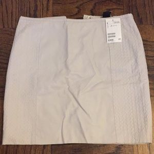 Faux leather beige mini skirt